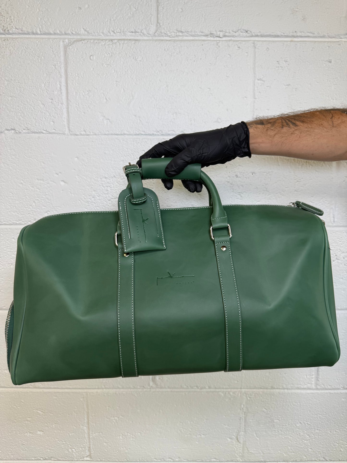 P A T I N A Duffle Bag